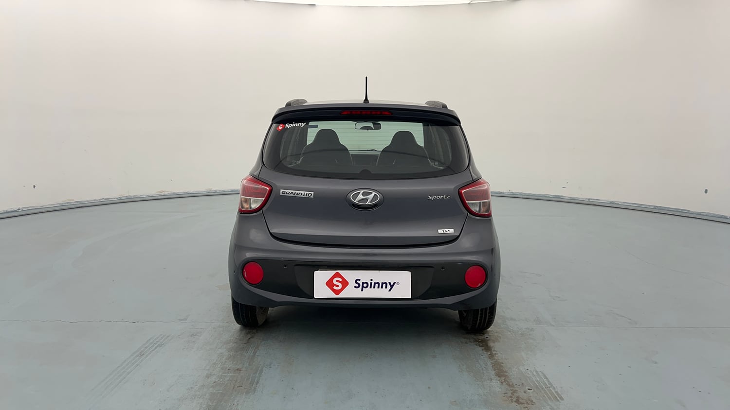 Used 2019 Hyundai Grand i10 Sportz AT 1.2 Kappa VTVT Petrol Automatic exterior BACK VIEW