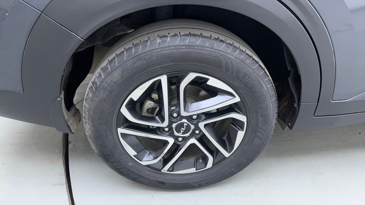 Used 2023 Kia Carens Prestige Plus 1.4 Petrol MT 7 STR Petrol Manual tyres RIGHT REAR TYRE RIM VIEW
