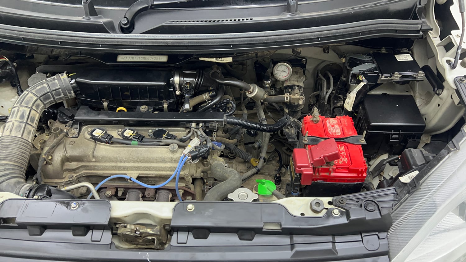 Used 2022 Maruti Suzuki Wagon R LXi (O) 1.0 CNG Cng Manual engine ENGINE LEFT SIDE VIEW