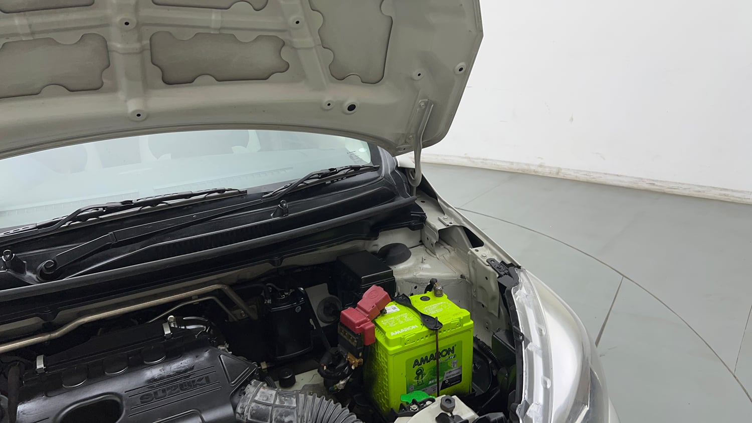 Used 2018 Maruti Suzuki Celerio ZXi (O) AMT Petrol Automatic engine ENGINE LEFT SIDE HINGE & APRON VIEW