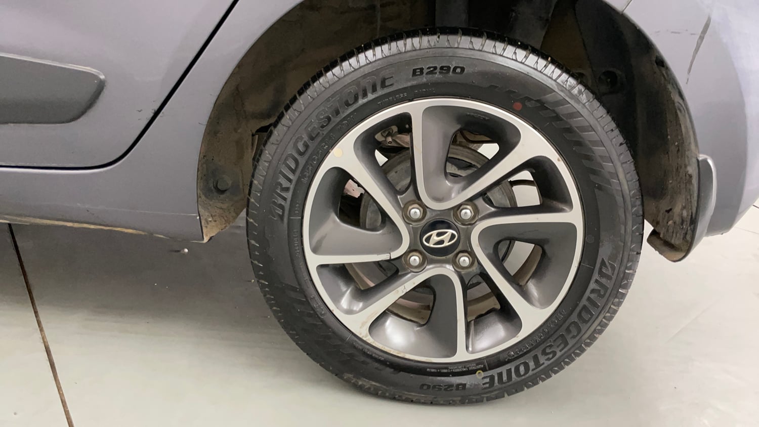 Used 2019 Hyundai Grand i10 Sportz AT 1.2 Kappa VTVT Petrol Automatic tyres LEFT REAR TYRE RIM VIEW