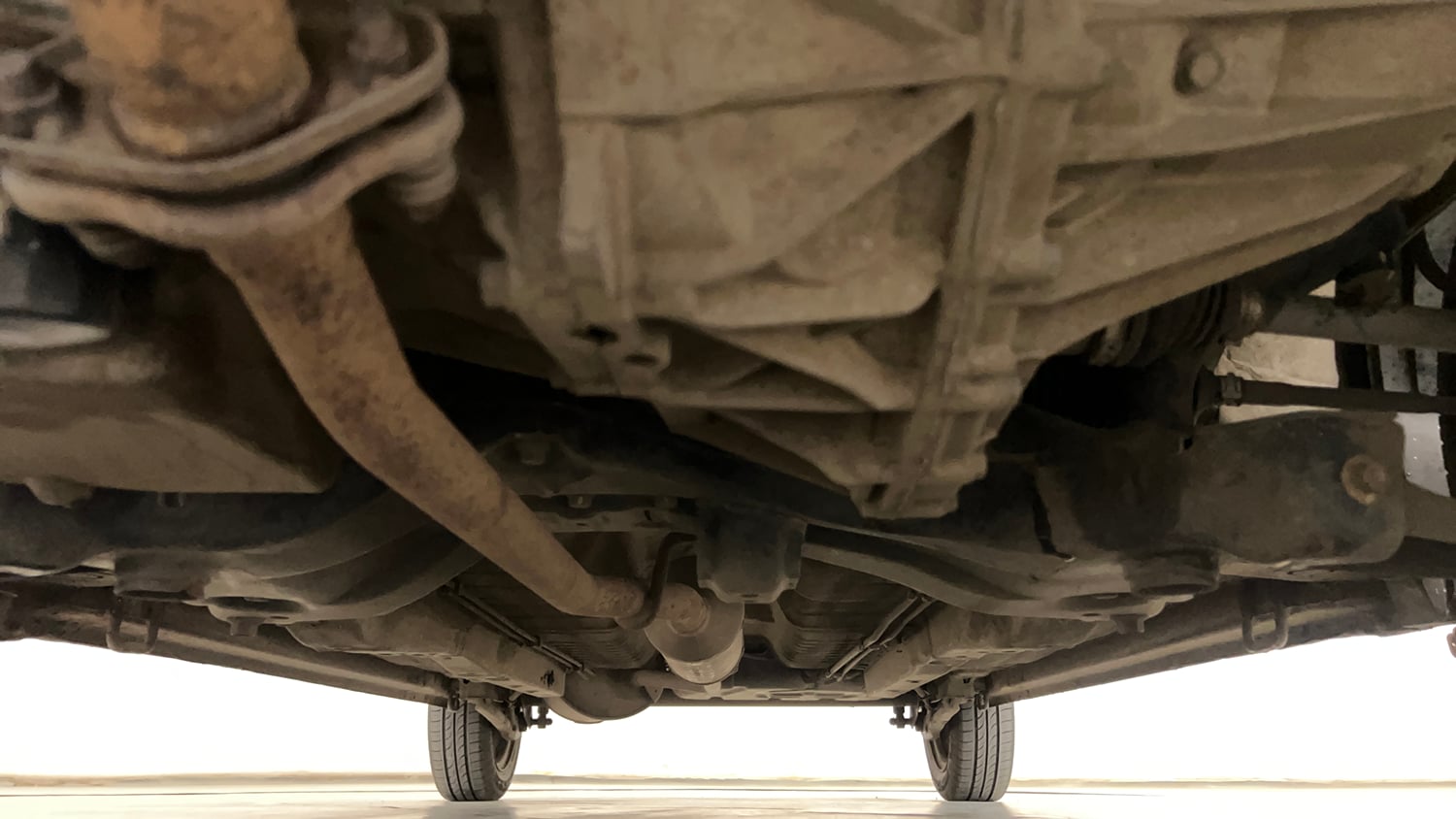 Used 2016 Maruti Suzuki Wagon R 1.0 VXI AMT Petrol Automatic extra FRONT LEFT UNDERBODY VIEW