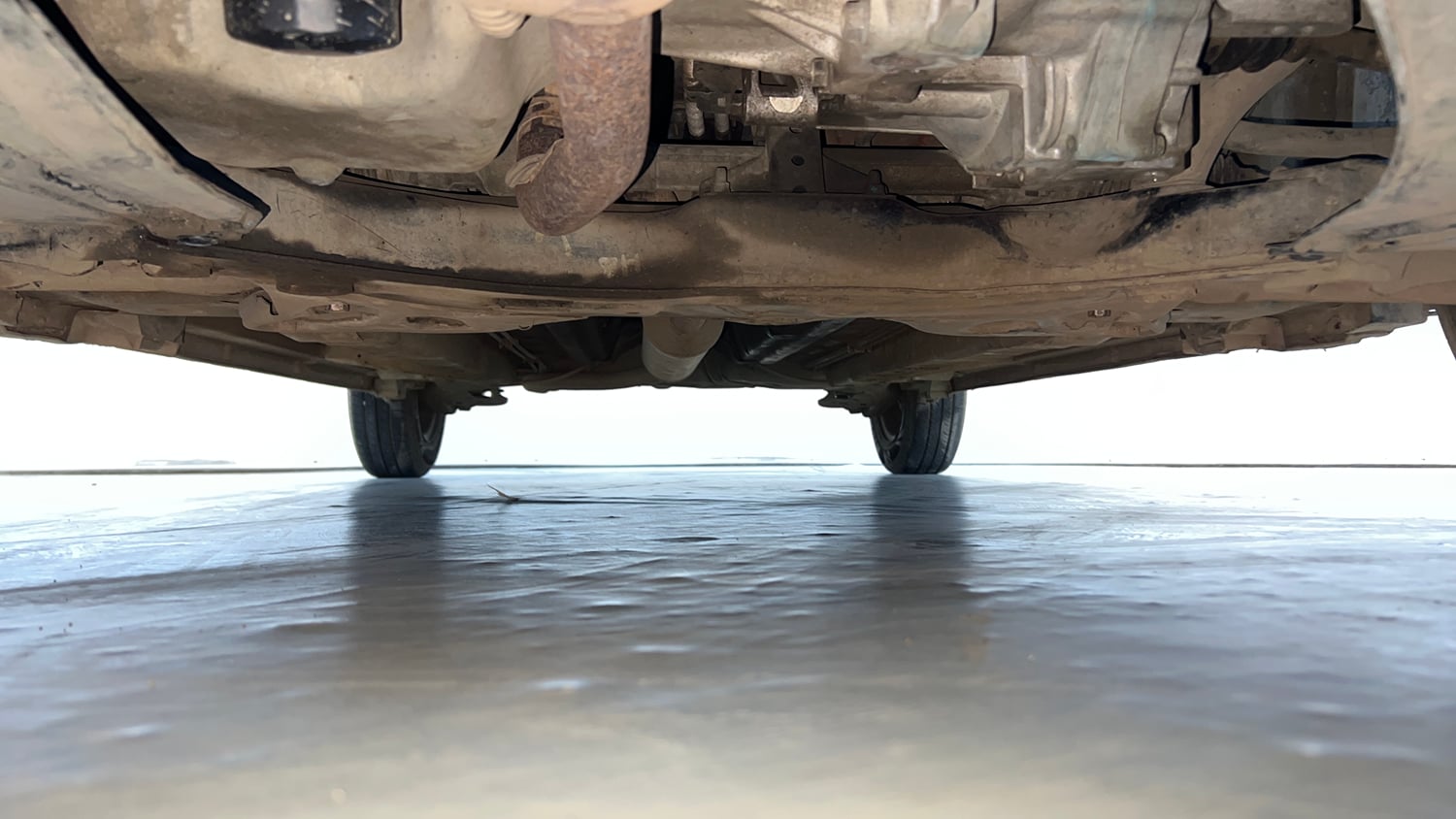 Used 2012 Maruti Suzuki Swift VXi Petrol Manual extra FRONT LEFT UNDERBODY VIEW