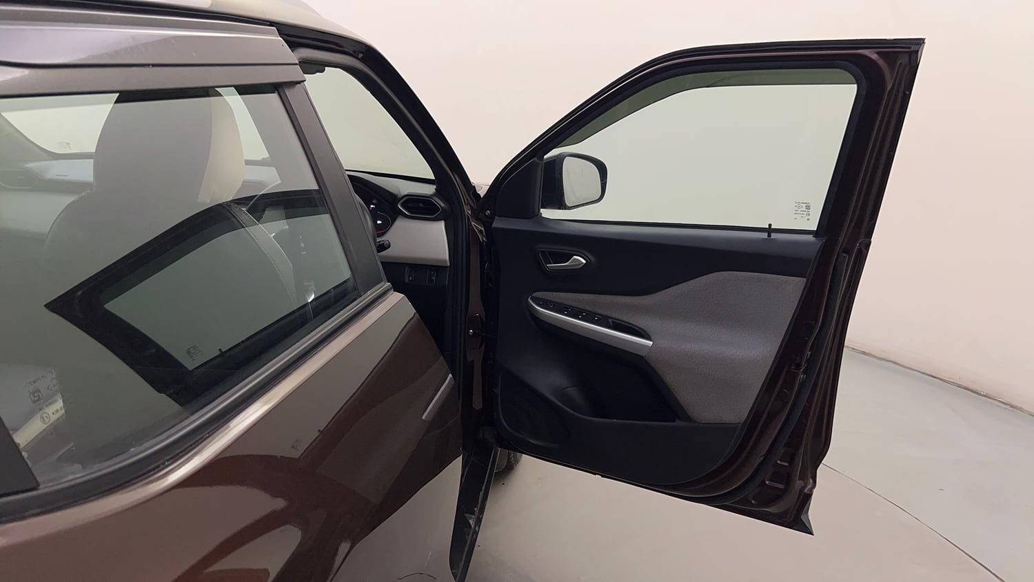 Used 2022 Nissan Magnite XV Turbo CVT Dual Tone Petrol Automatic interior RIGHT FRONT DOOR OPEN VIEW