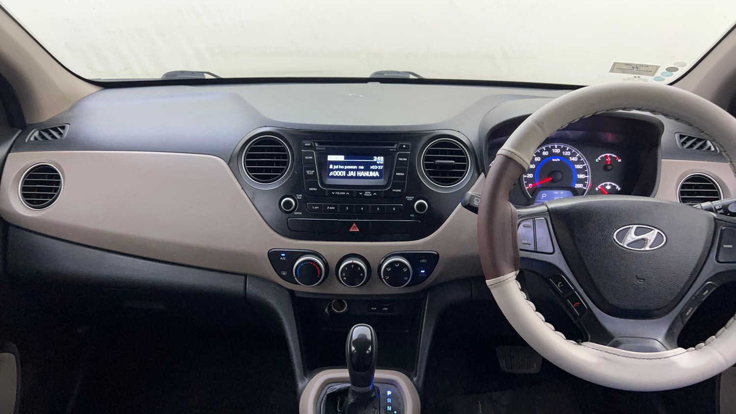 Used 2015 Hyundai Grand i10 Asta AT 1.2 Kappa VTVT Petrol Automatic interior MUSIC SYSTEM & AC CONTROL VIEW