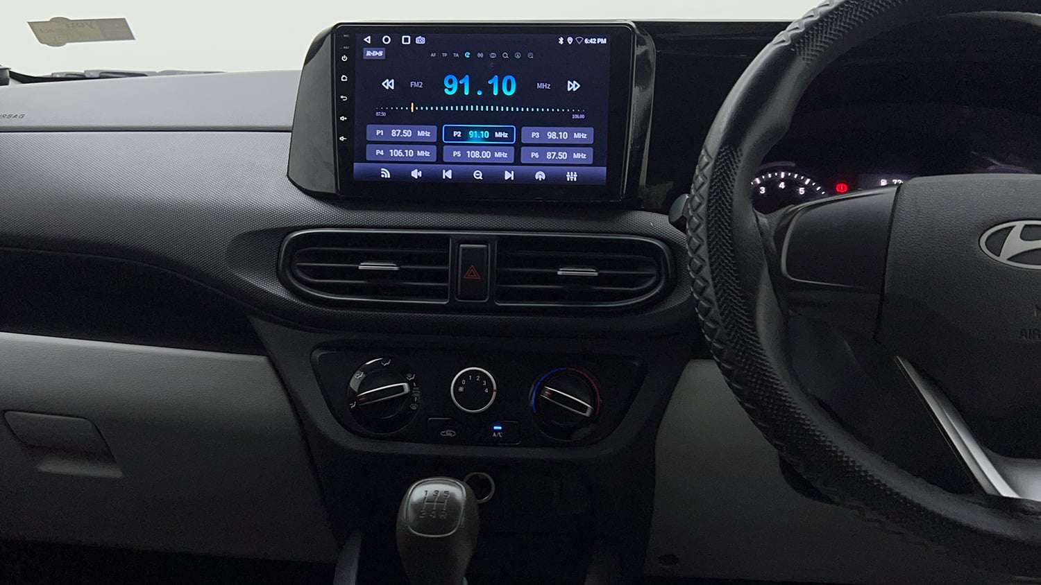 Used 2025 Hyundai Grand i10 Nios Era 1.2 Kappa Petrol Manual interior MUSIC SYSTEM & AC CONTROL VIEW