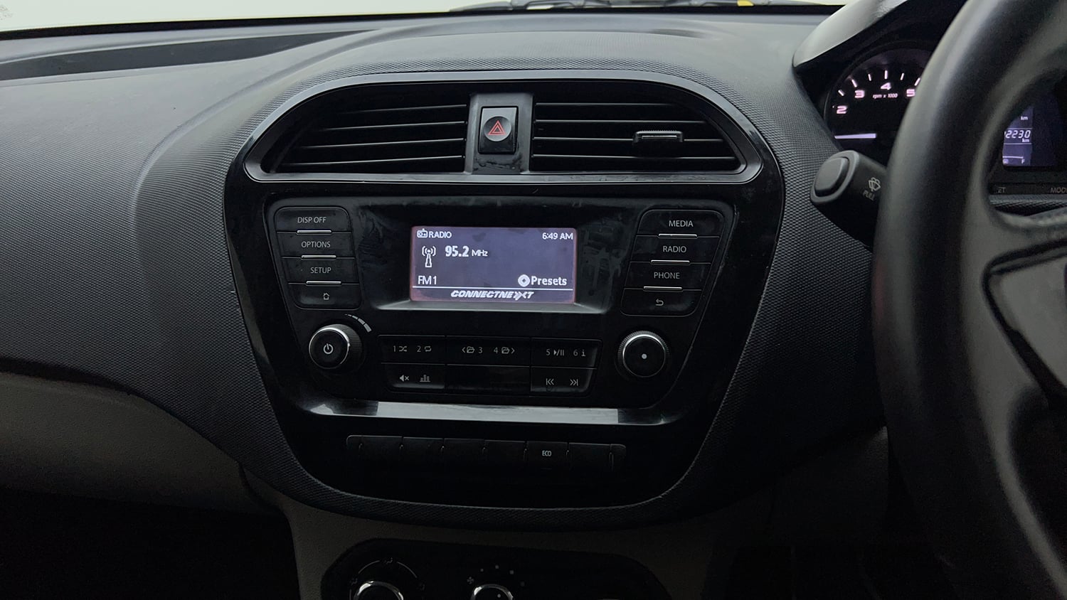 Used 2018 Tata Tiago Revotron XT Petrol Manual top_features Integrated (in-dash) music system