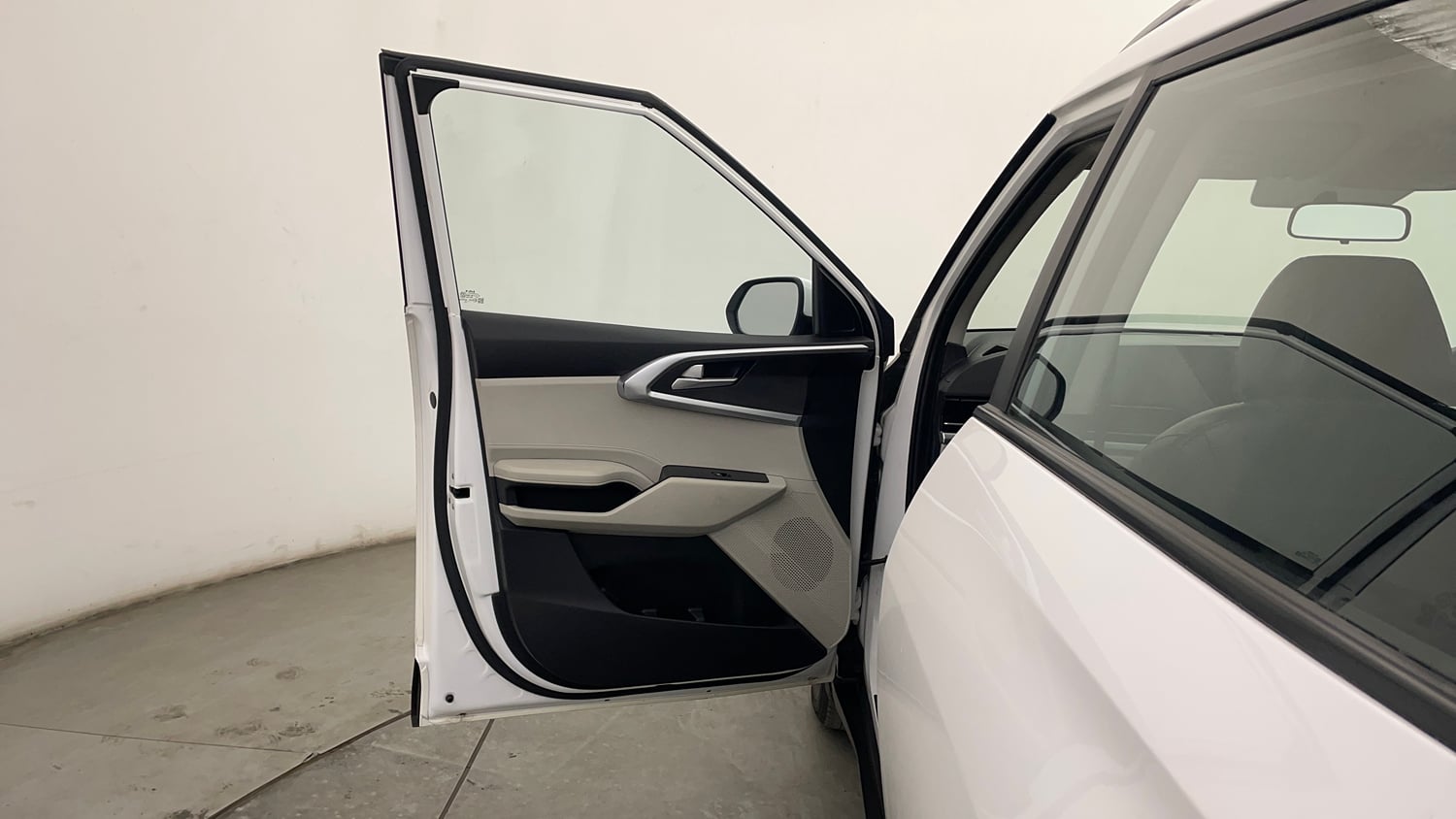 Used 2022 Kia Carens Prestige 1.4 Petrol MT 7 STR Petrol Manual interior LEFT FRONT DOOR OPEN VIEW