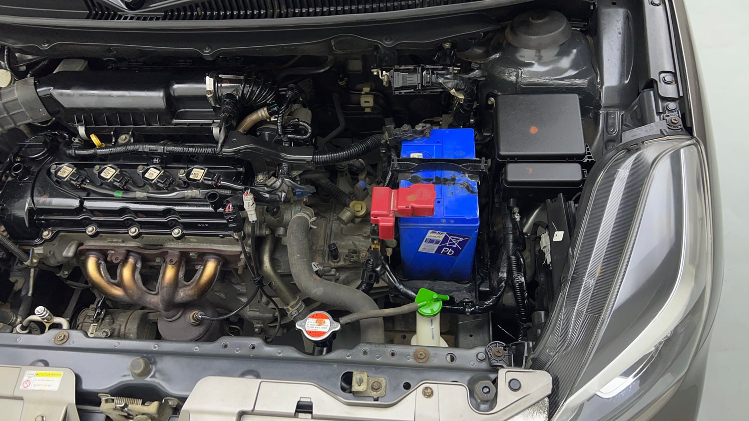 Used 2020 Maruti Suzuki Baleno Alpha Petrol Manual engine ENGINE LEFT SIDE VIEW