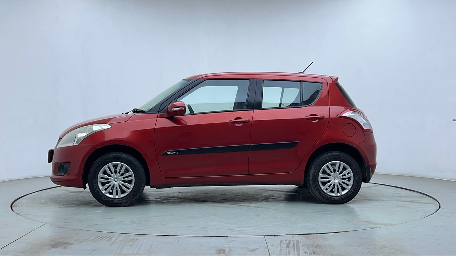 Used 2012 Maruti Suzuki Swift VXi Petrol Manual exterior LEFT SIDE VIEW