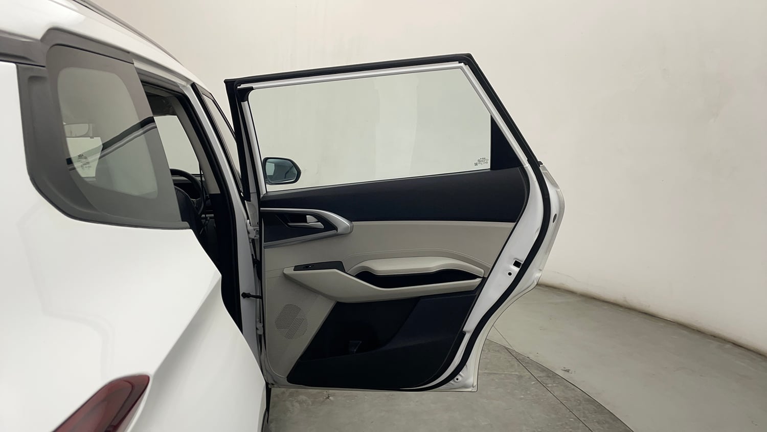 Used 2022 Kia Carens Prestige 1.4 Petrol MT 7 STR Petrol Manual interior RIGHT REAR DOOR OPEN VIEW