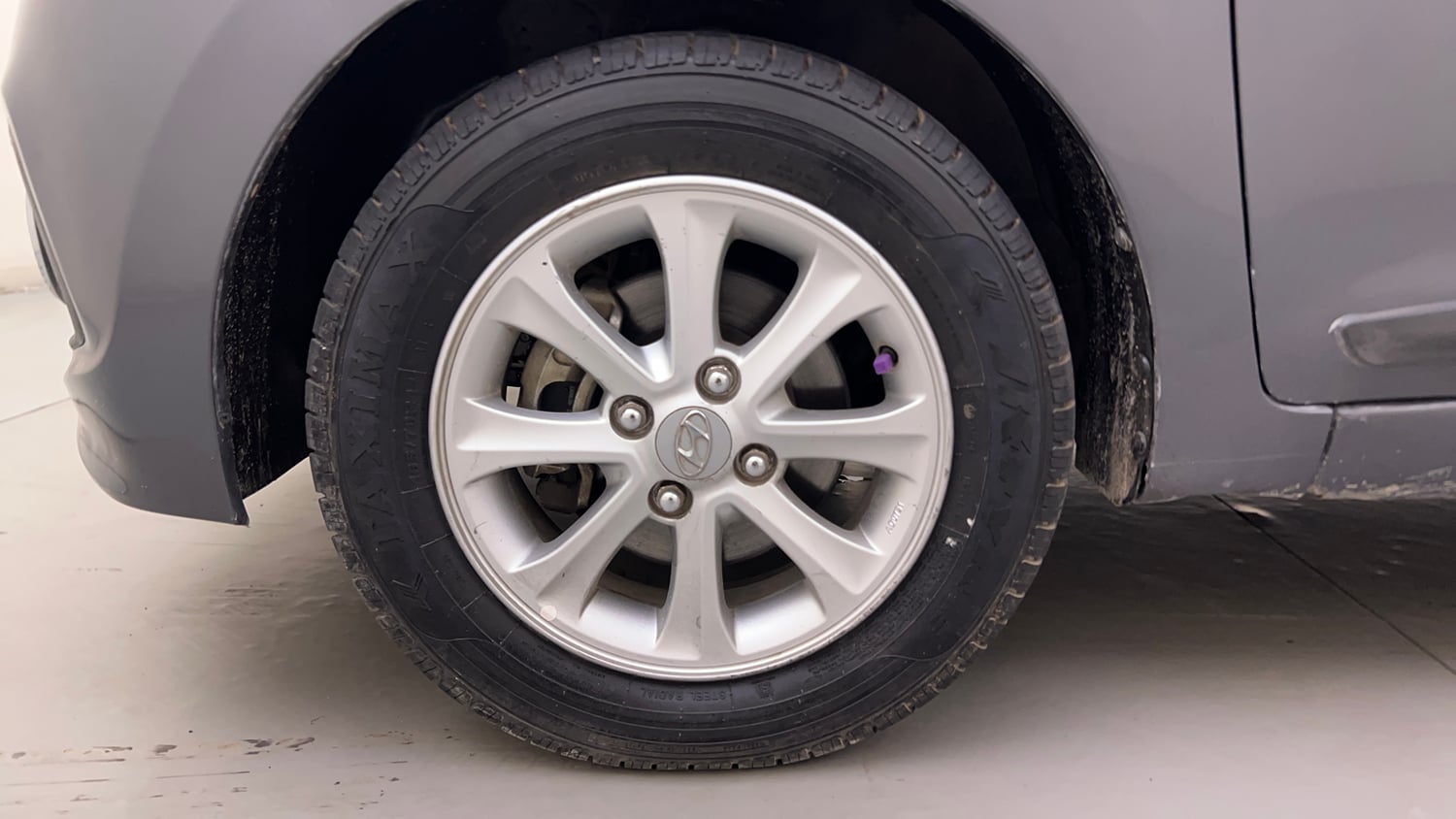 Used 2015 Hyundai Grand i10 Asta AT 1.2 Kappa VTVT Petrol Automatic tyres LEFT FRONT TYRE RIM VIEW