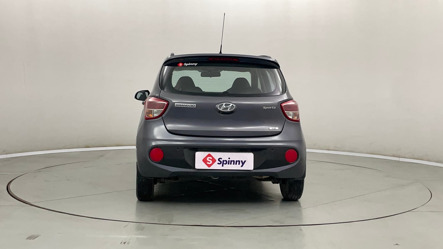 Used 2019 Hyundai Grand i10 Sportz AT 1.2 Kappa VTVT Petrol Automatic exterior BACK VIEW