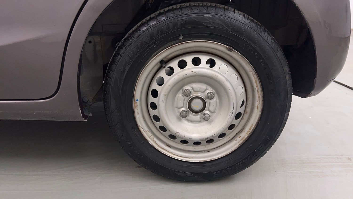 Used 2013 Honda Brio E MT Petrol Manual tyres LEFT REAR TYRE RIM VIEW