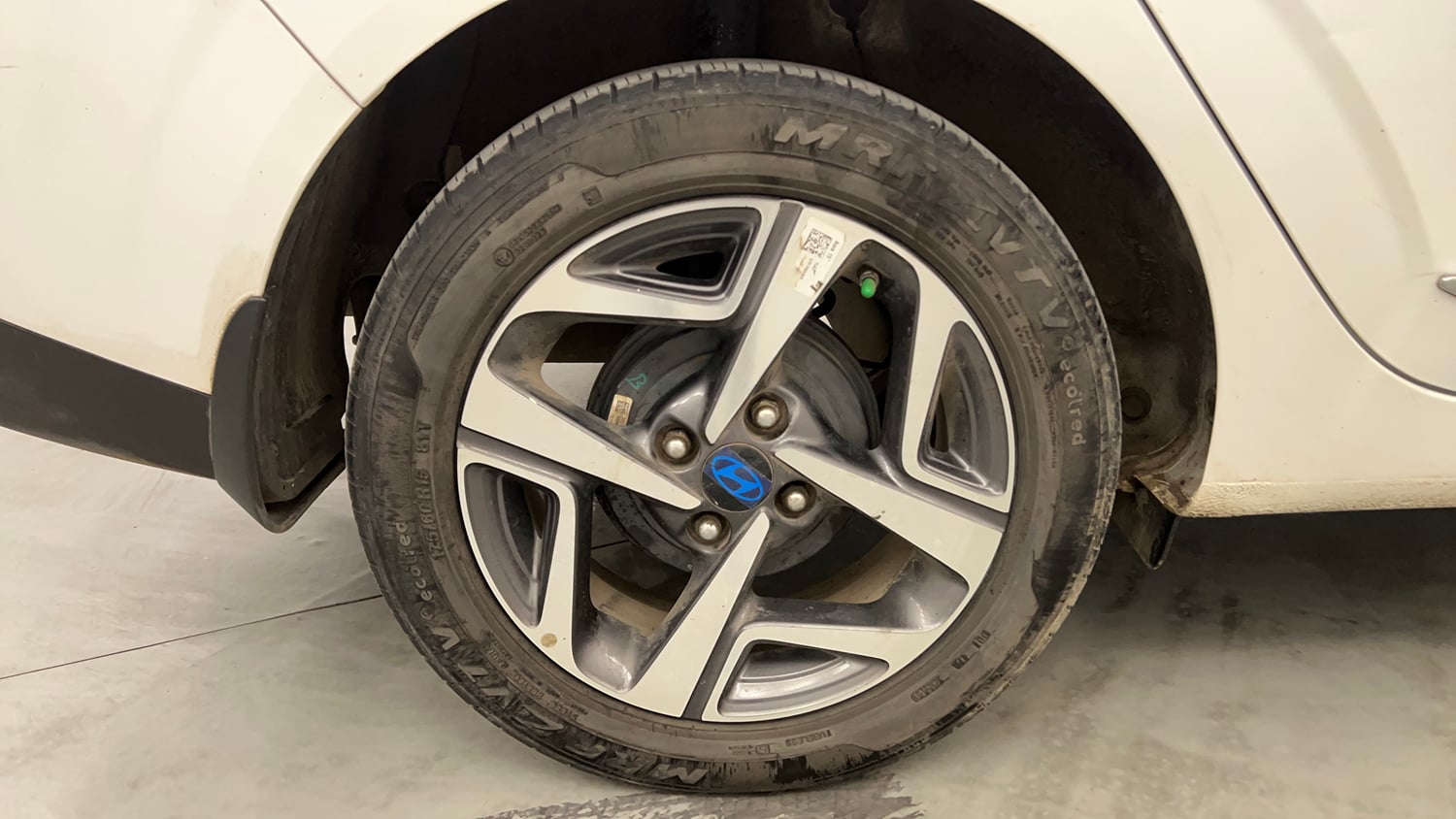 Used 2023 Hyundai Aura SX 1.2 CNG Cng Manual tyres RIGHT REAR TYRE RIM VIEW