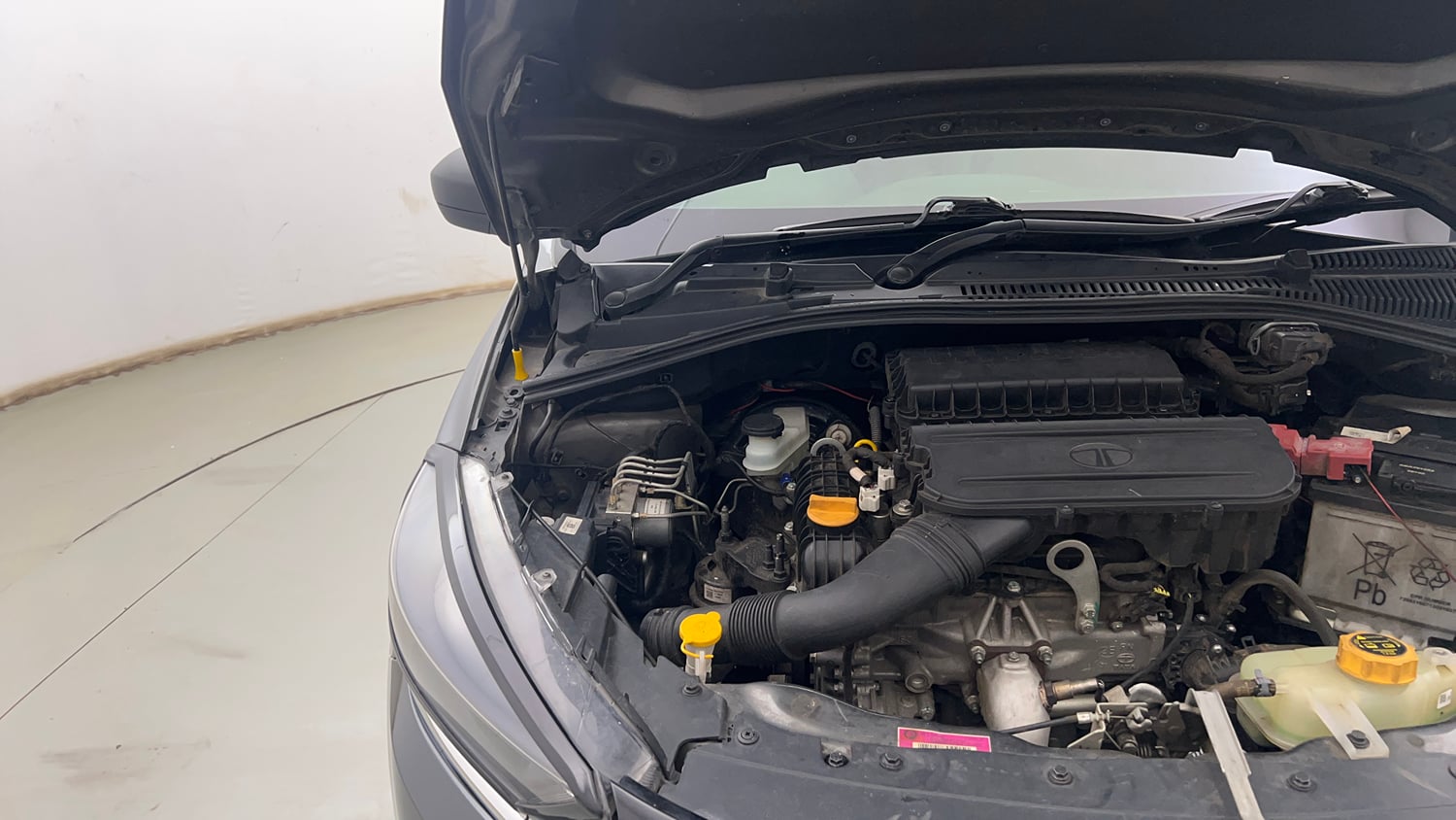 Used 2025 Tata Tiago XM Petrol Manual engine ENGINE RIGHT SIDE HINGE & APRON VIEW