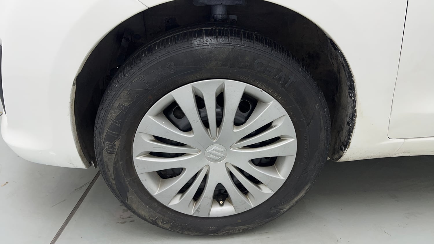 Used 2013 Maruti Suzuki Ertiga Vxi Petrol Manual tyres LEFT FRONT TYRE RIM VIEW