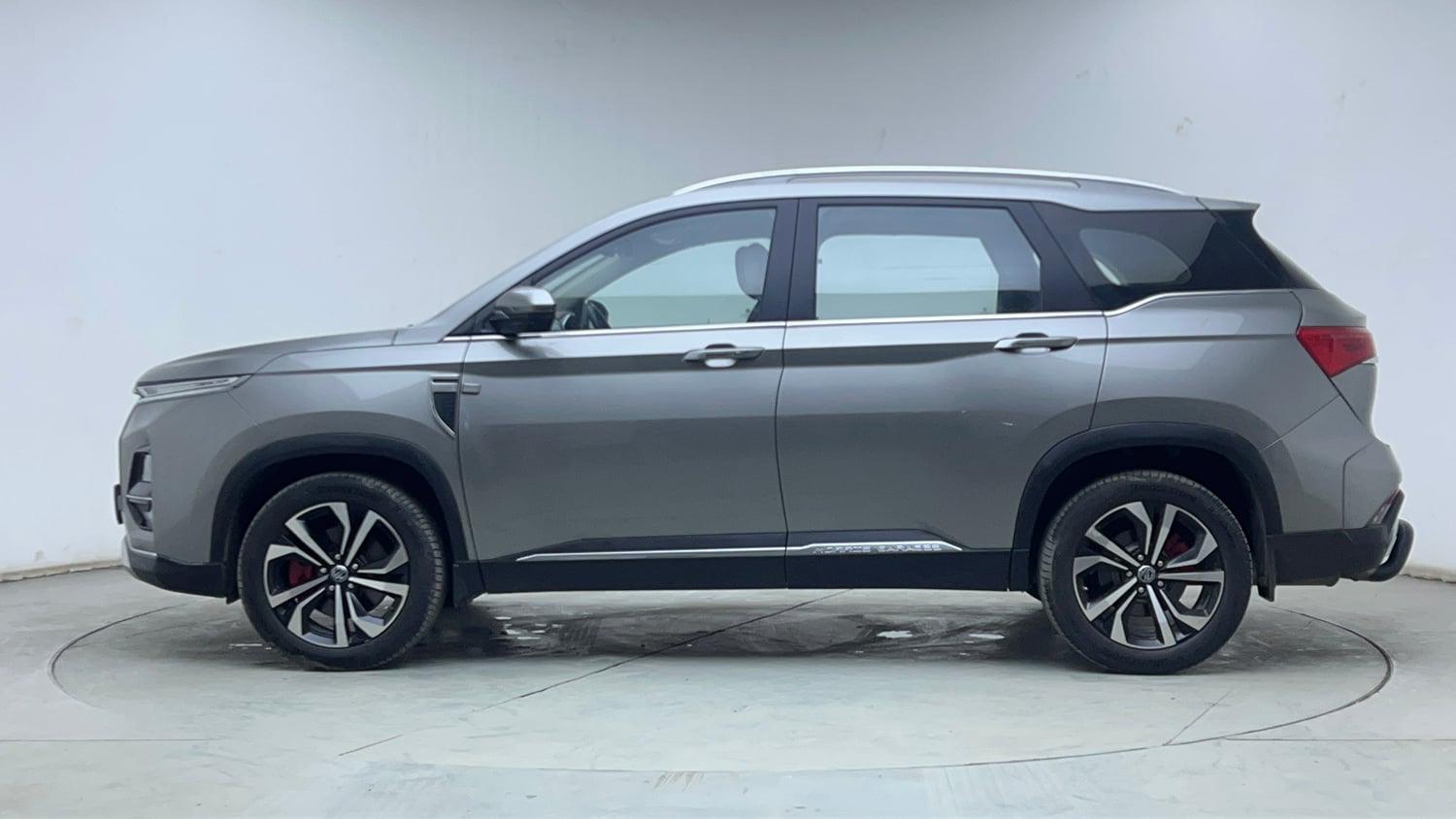 Used 2023 MG Motors Hector Plus Savvy Pro 1.5 Turbo Petrol CVT 7 STR Petrol Automatic exterior LEFT SIDE VIEW