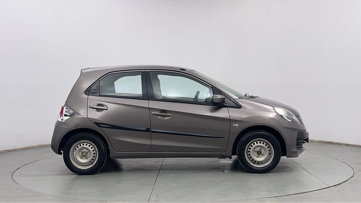 Used 2013 Honda Brio E MT Petrol Manual exterior RIGHT SIDE VIEW