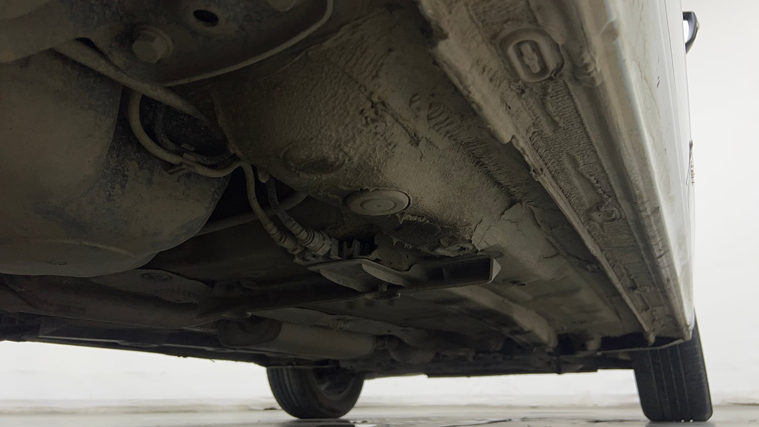 Used 2025 Volkswagen Virtus Topline 1.0 TSI AT Petrol Automatic extra REAR RIGHT UNDERBODY VIEW