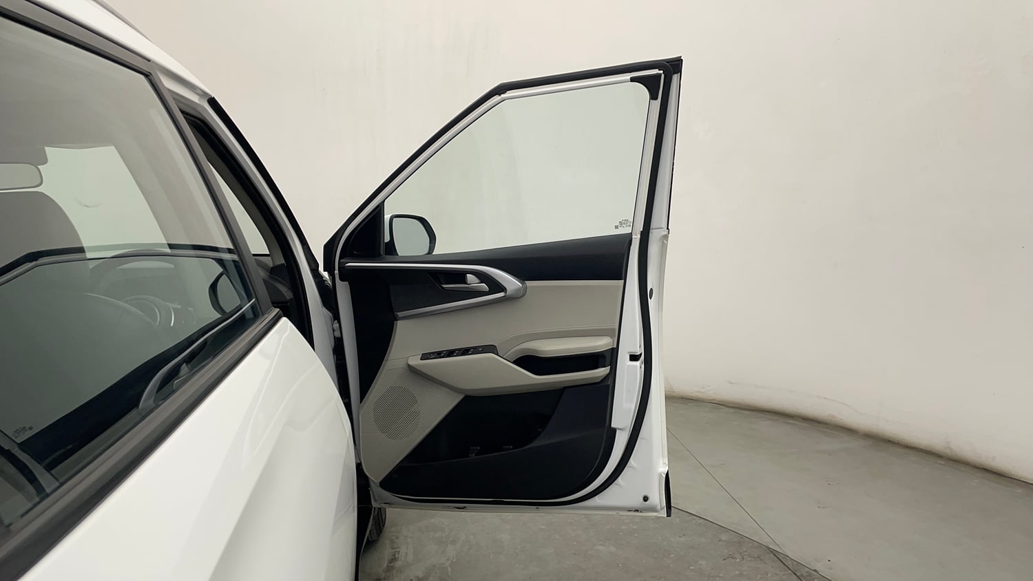 Used 2022 Kia Carens Prestige 1.4 Petrol MT 7 STR Petrol Manual interior RIGHT FRONT DOOR OPEN VIEW