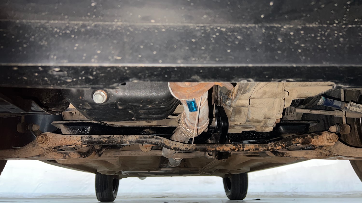 Used 2018 Tata Tiago Revotron XT Petrol Manual extra FRONT LEFT UNDERBODY VIEW