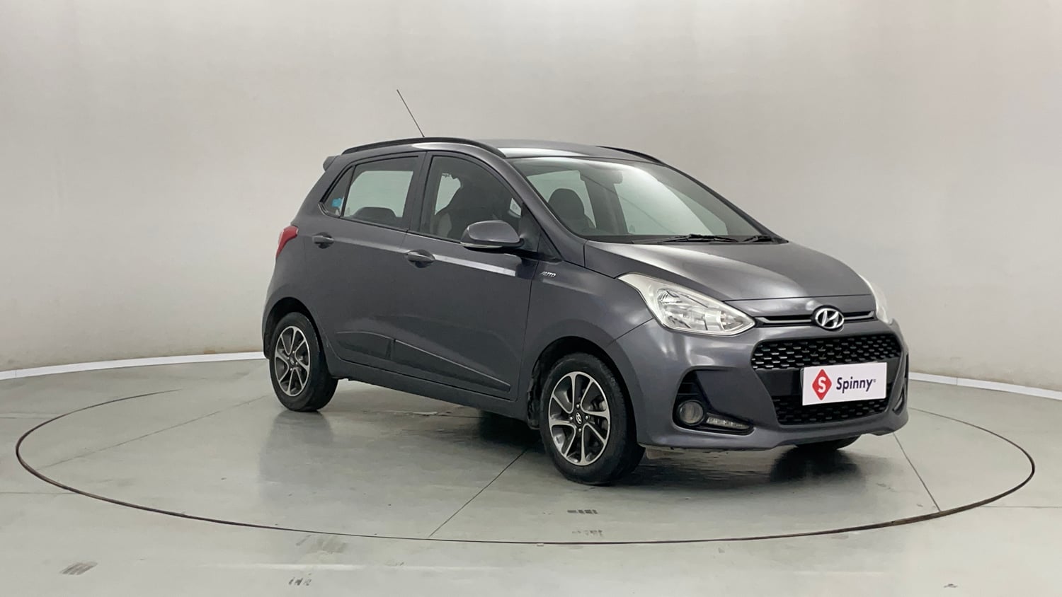 Used 2019 Hyundai Grand i10 Sportz AT 1.2 Kappa VTVT Petrol Automatic exterior RIGHT FRONT CORNER VIEW