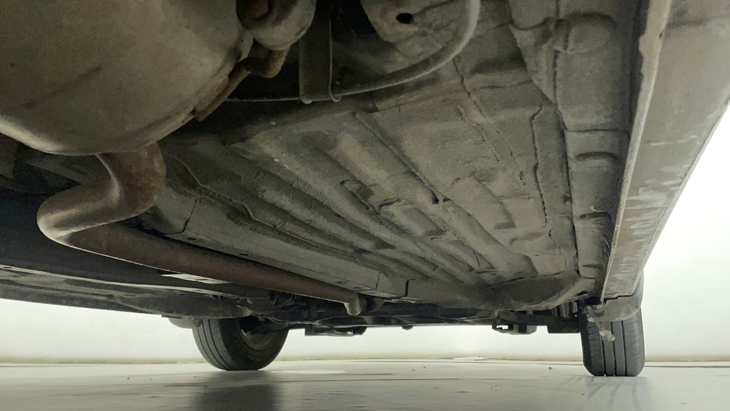Used 2023 Honda Amaze VX CVT 1.2 Petrol Petrol Automatic extra REAR RIGHT UNDERBODY VIEW