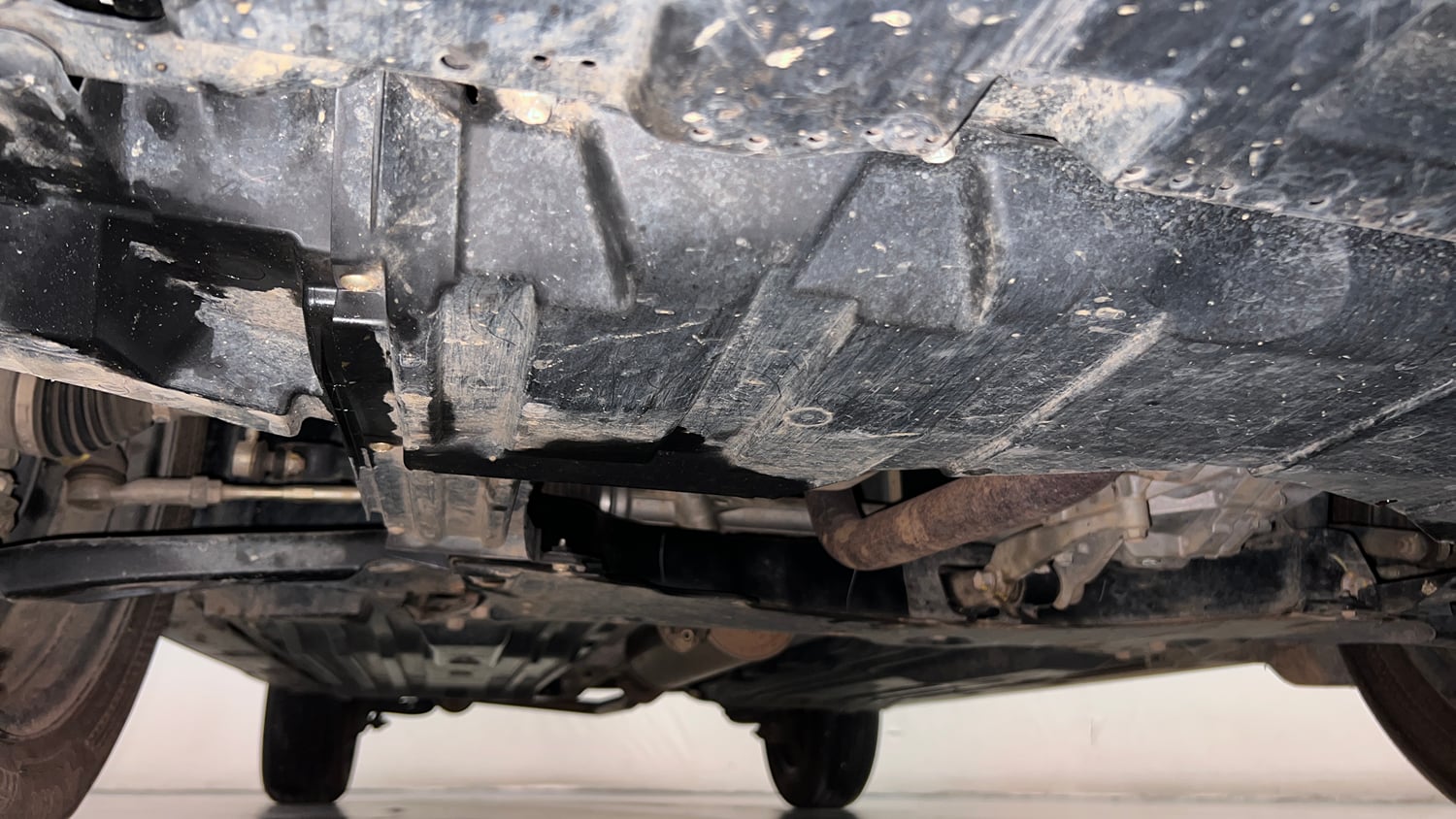Used 2025 Maruti Suzuki Grand Vitara Delta Smart Hybrid Petrol Manual extra FRONT LEFT UNDERBODY VIEW