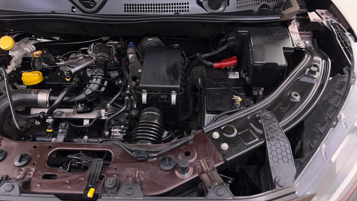 Used 2022 Nissan Magnite XV Turbo CVT Dual Tone Petrol Automatic engine ENGINE LEFT SIDE VIEW