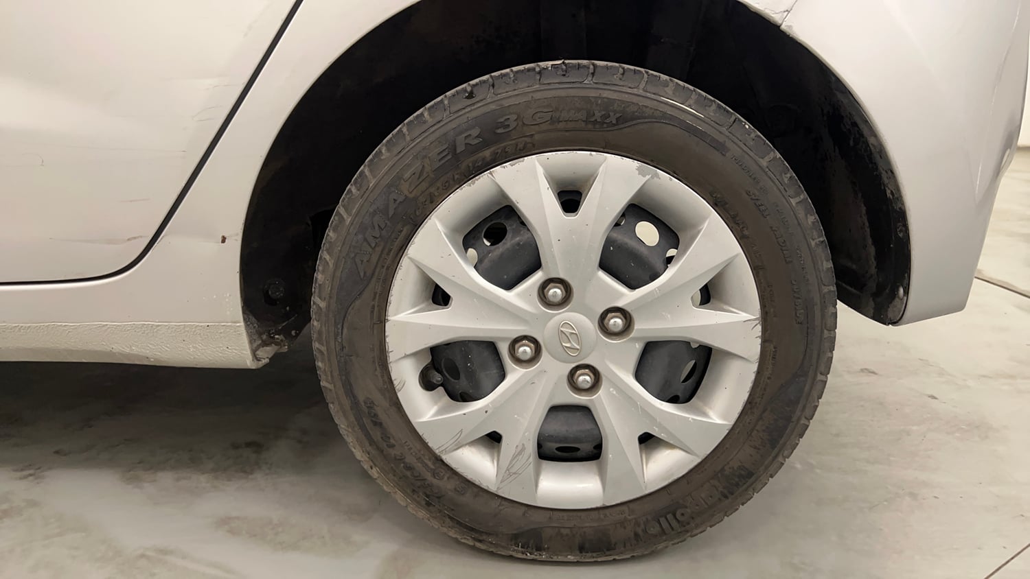 Used 2016 Hyundai Grand i10 Magna 1.2 Kappa VTVT Petrol Manual tyres LEFT REAR TYRE RIM VIEW