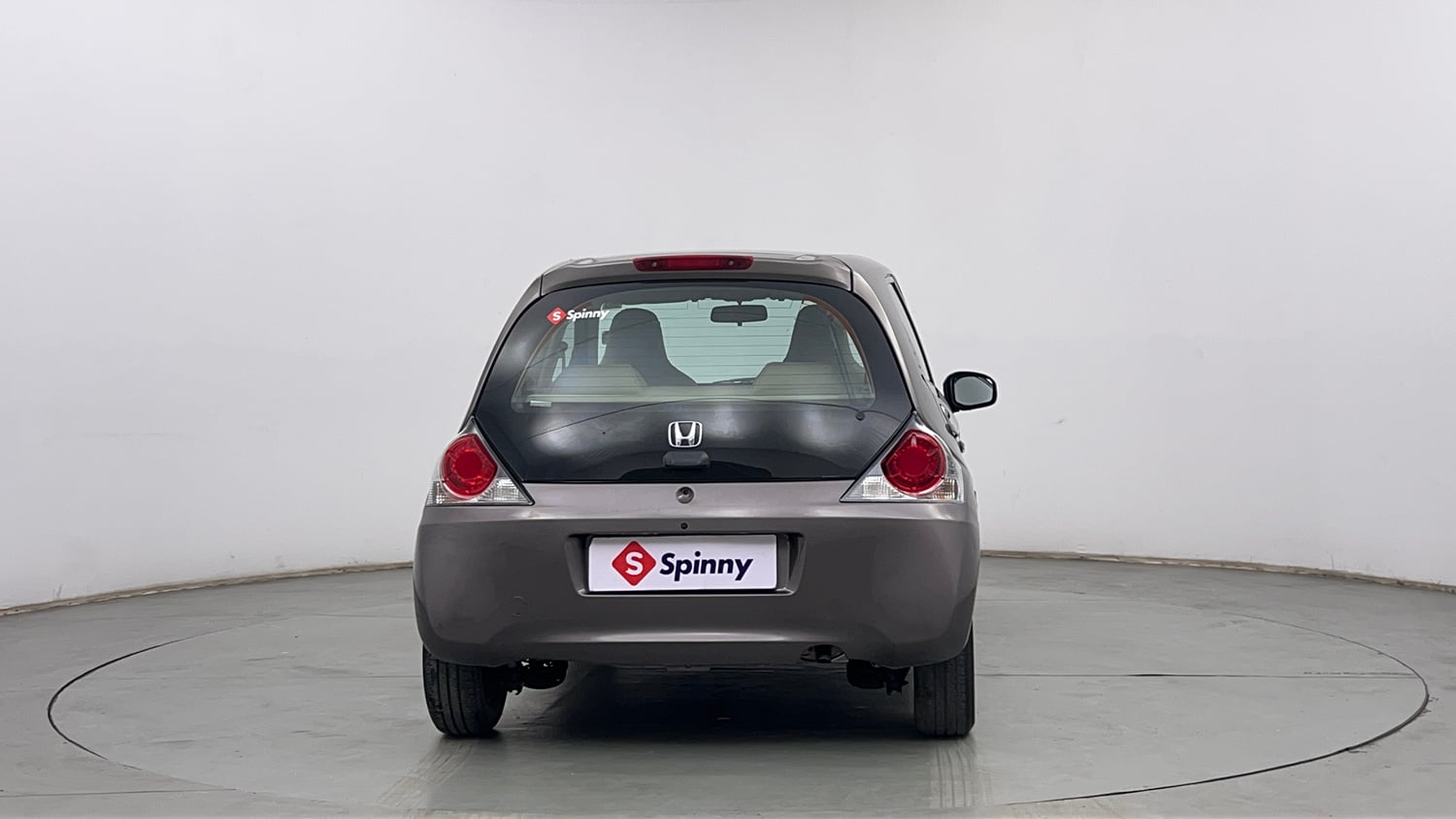 Used 2013 Honda Brio E MT Petrol Manual exterior BACK VIEW