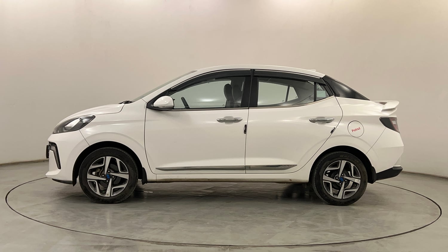 Used 2023 Hyundai Aura SX 1.2 CNG Cng Manual exterior LEFT SIDE VIEW