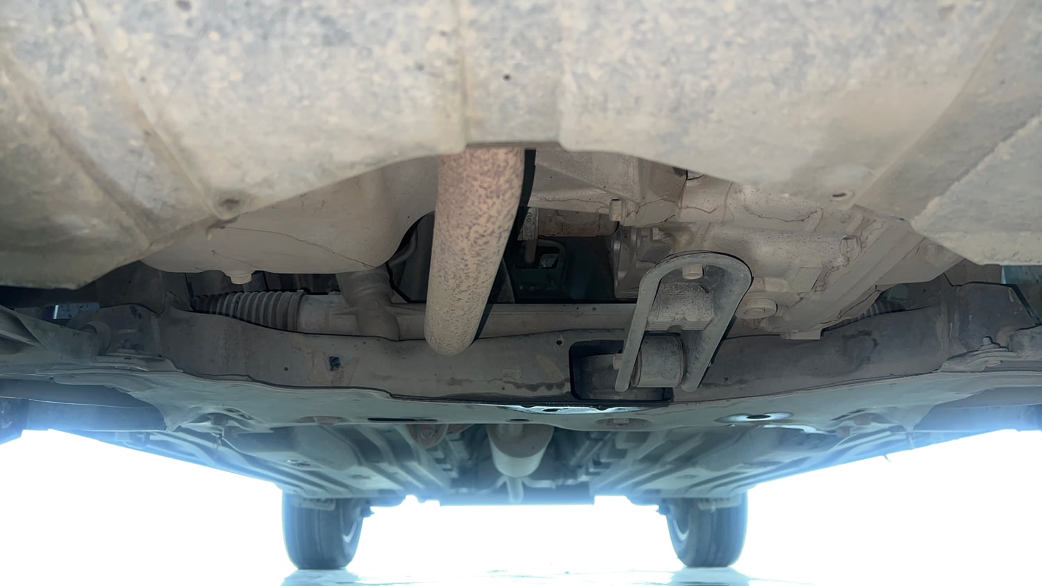 Used 2023 Maruti Suzuki Brezza ZXi Plus AT Petrol Automatic extra FRONT LEFT UNDERBODY VIEW
