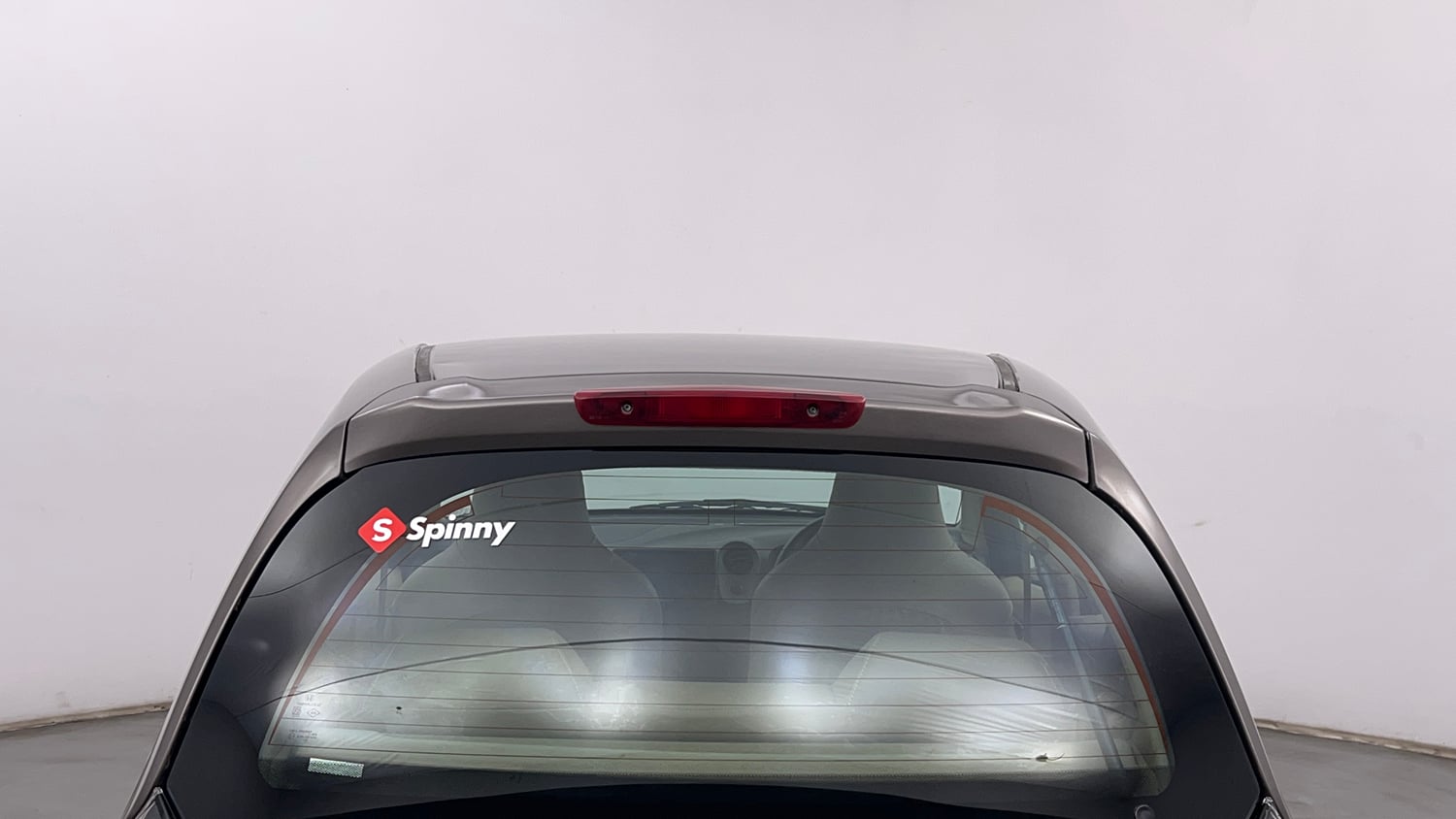 Used 2013 Honda Brio E MT Petrol Manual exterior BACK WINDSHIELD VIEW