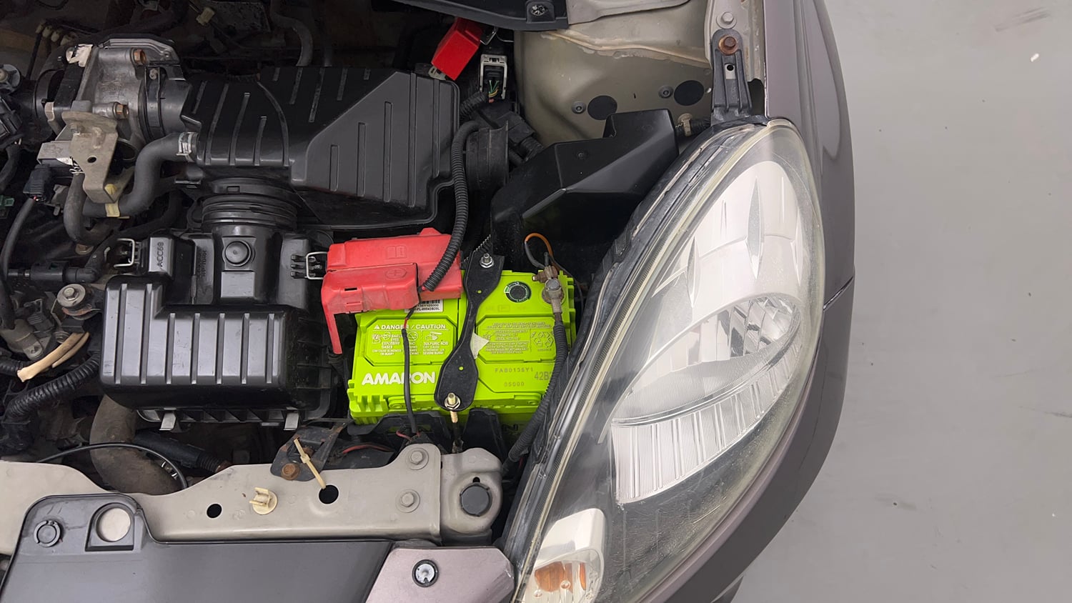 Used 2013 Honda Brio E MT Petrol Manual engine ENGINE LEFT SIDE VIEW