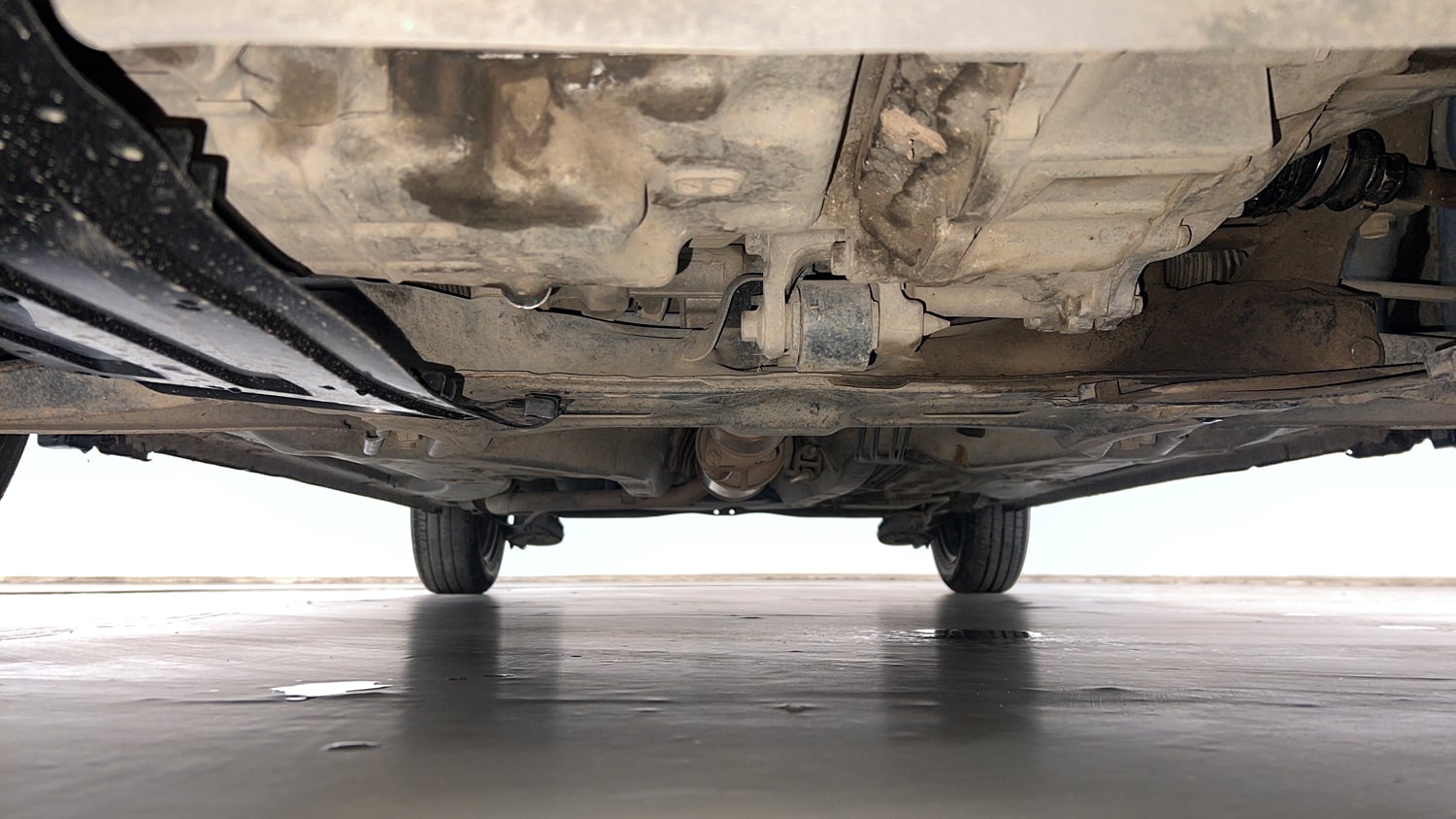 Used 2013 Honda Brio E MT Petrol Manual extra FRONT LEFT UNDERBODY VIEW