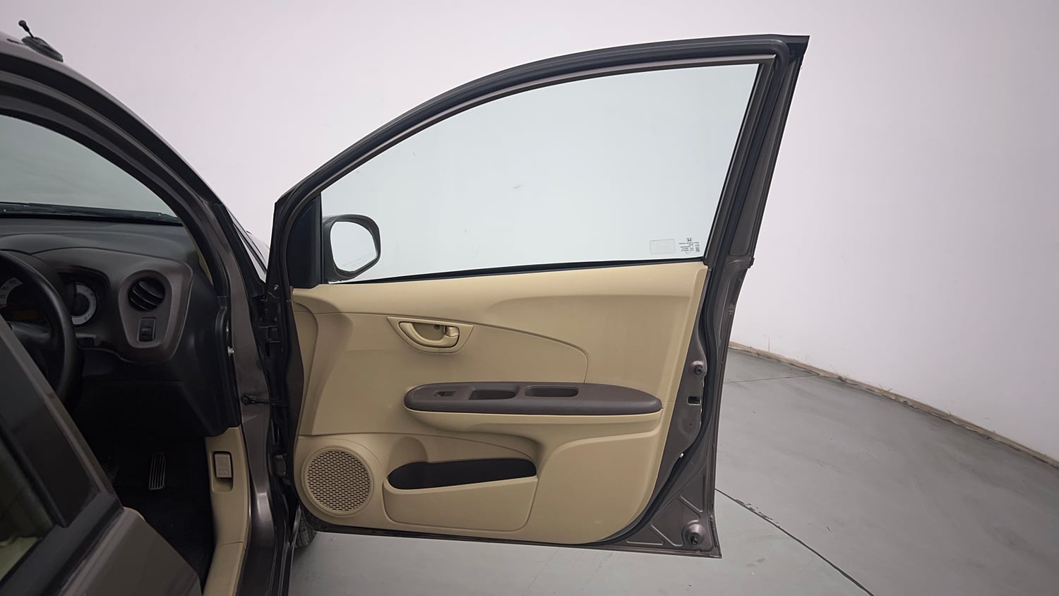 Used 2013 Honda Brio E MT Petrol Manual interior RIGHT FRONT DOOR OPEN VIEW
