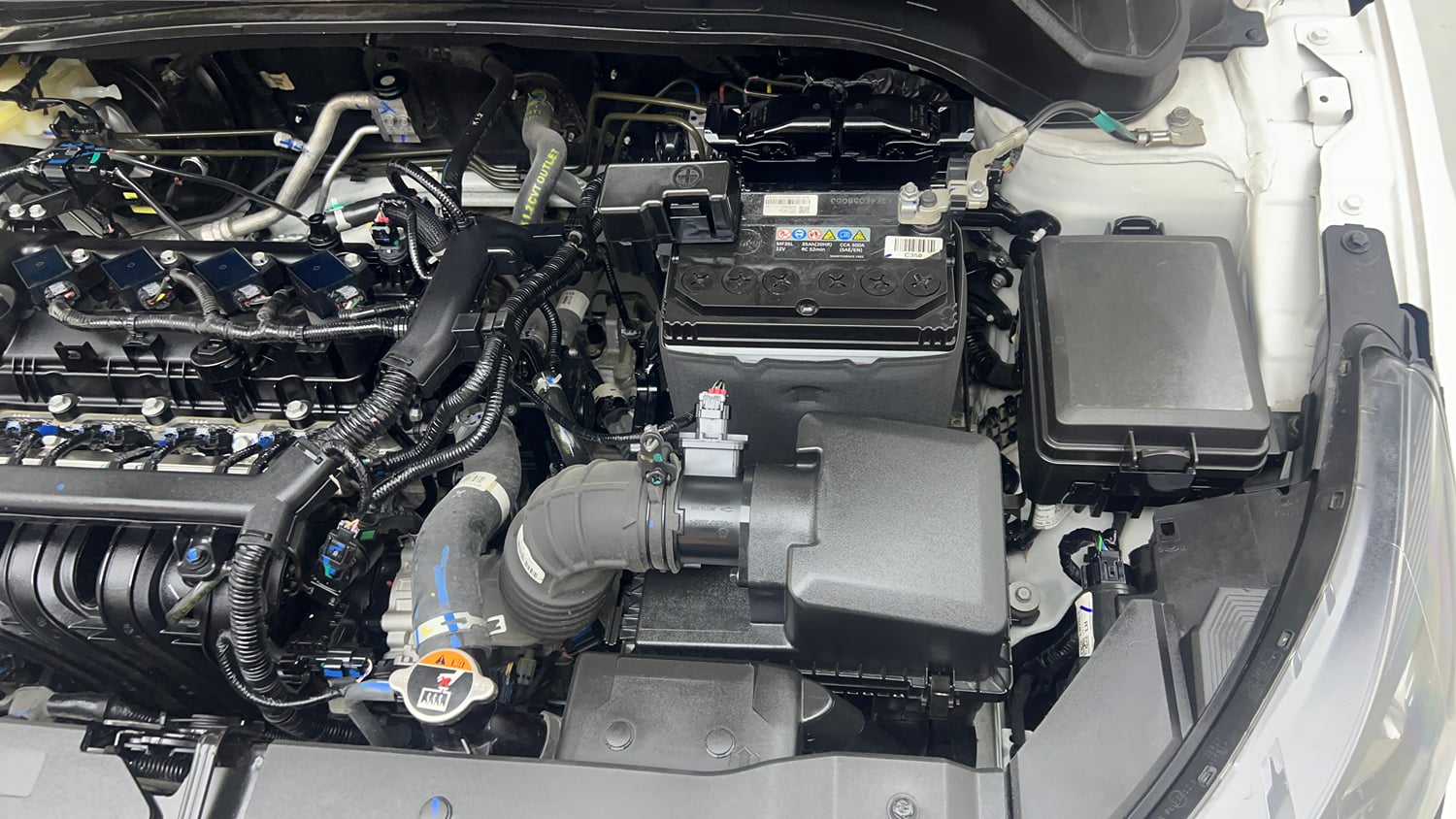 Used 2024 Hyundai i20 Sportz (O) 1.2 IVT Petrol Automatic engine ENGINE LEFT SIDE VIEW