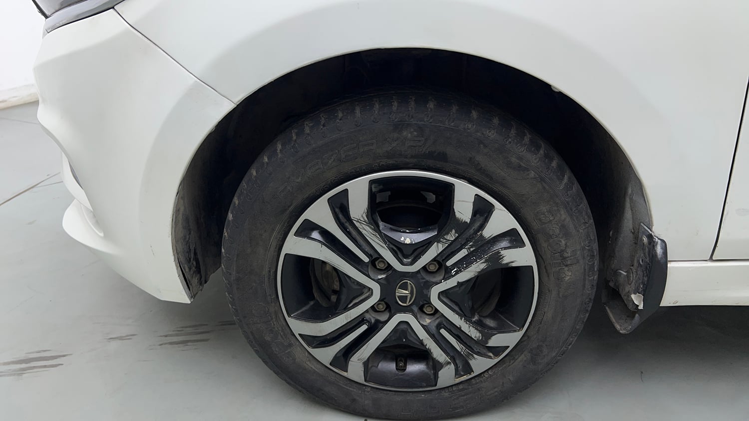 Used 2021 Tata Tiago XZ Petrol Manual tyres LEFT FRONT TYRE RIM VIEW