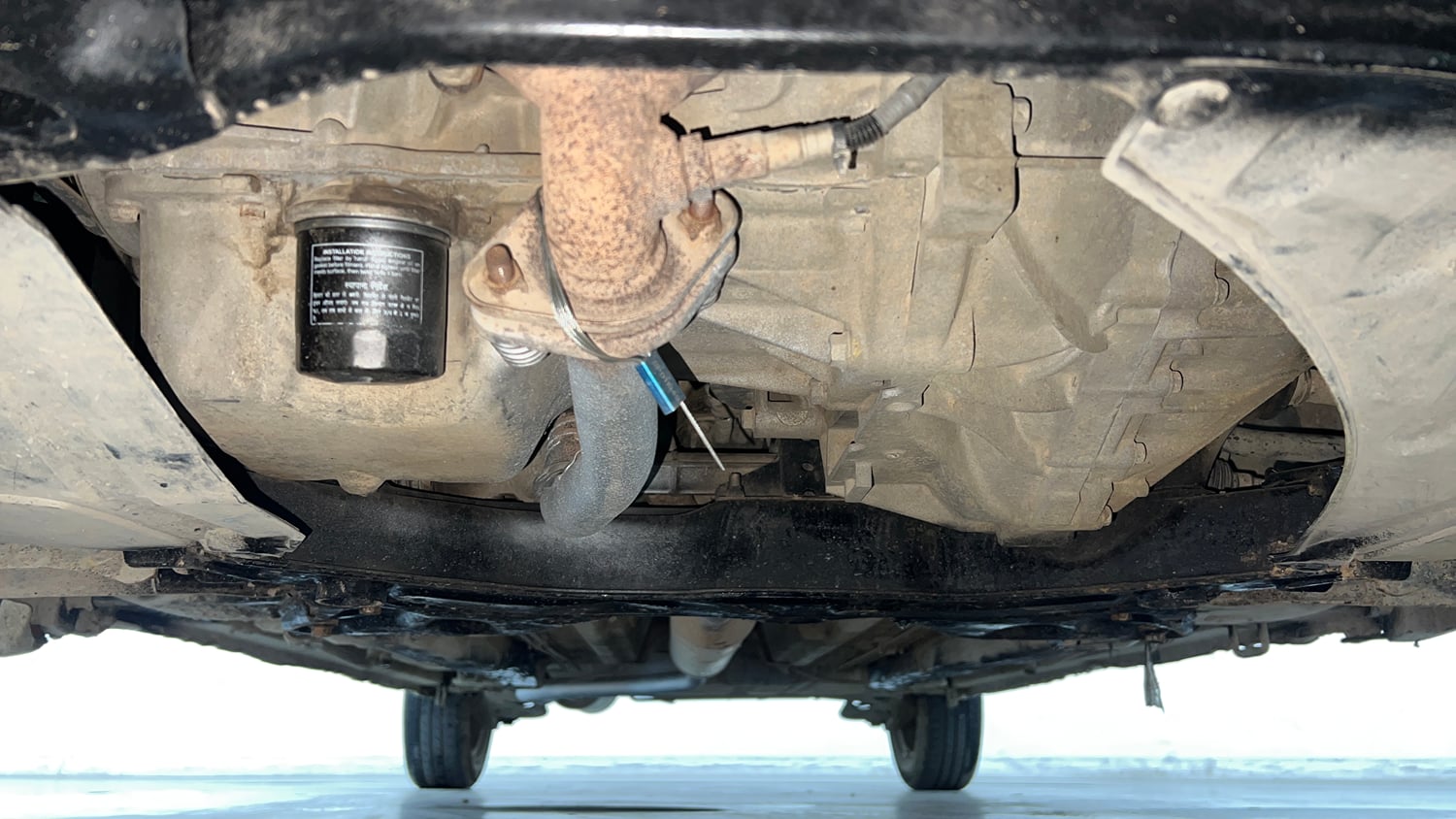 Used 2013 Maruti Suzuki Ertiga Vxi Petrol Manual extra FRONT LEFT UNDERBODY VIEW
