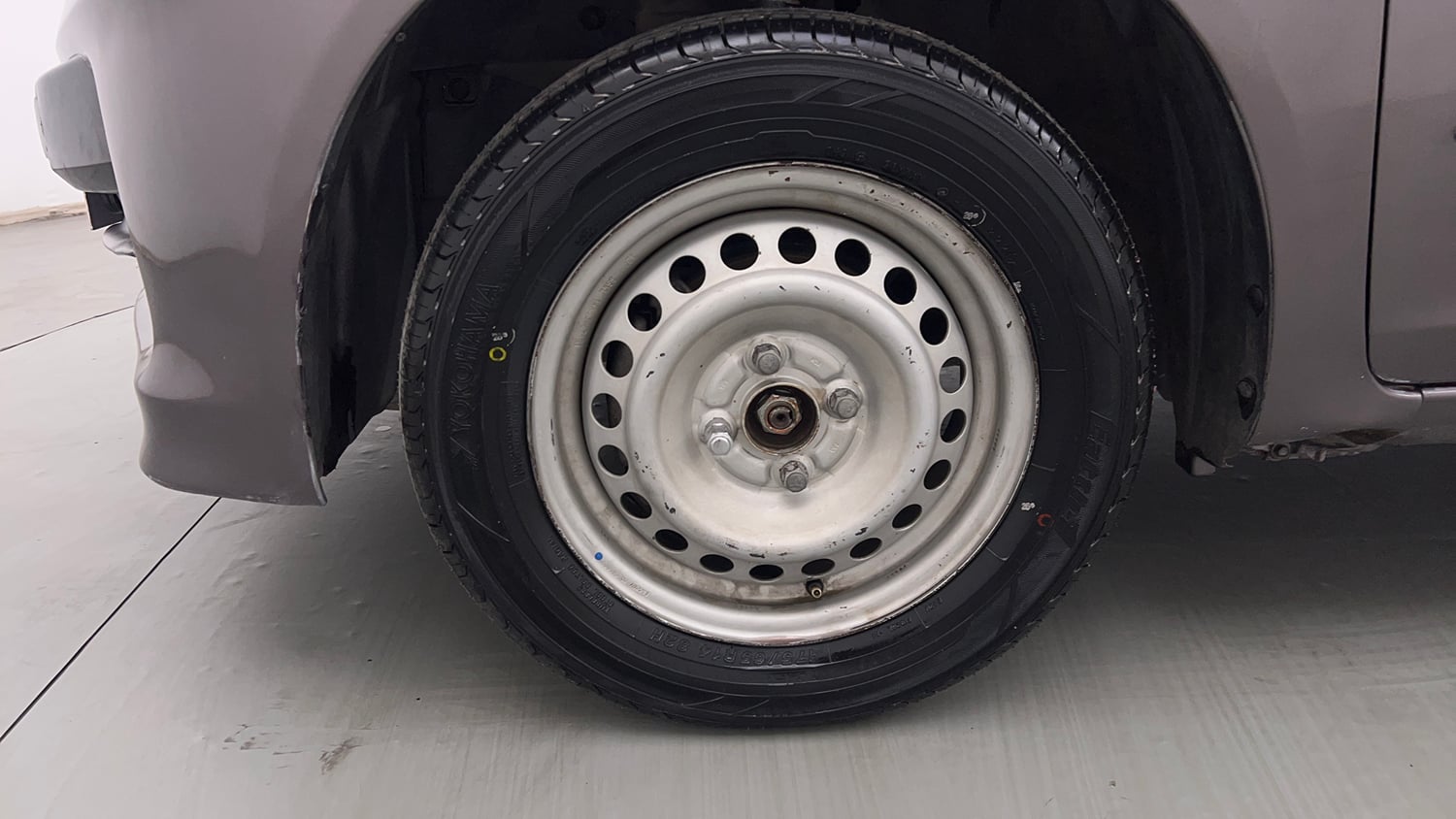 Used 2013 Honda Brio E MT Petrol Manual tyres LEFT FRONT TYRE RIM VIEW