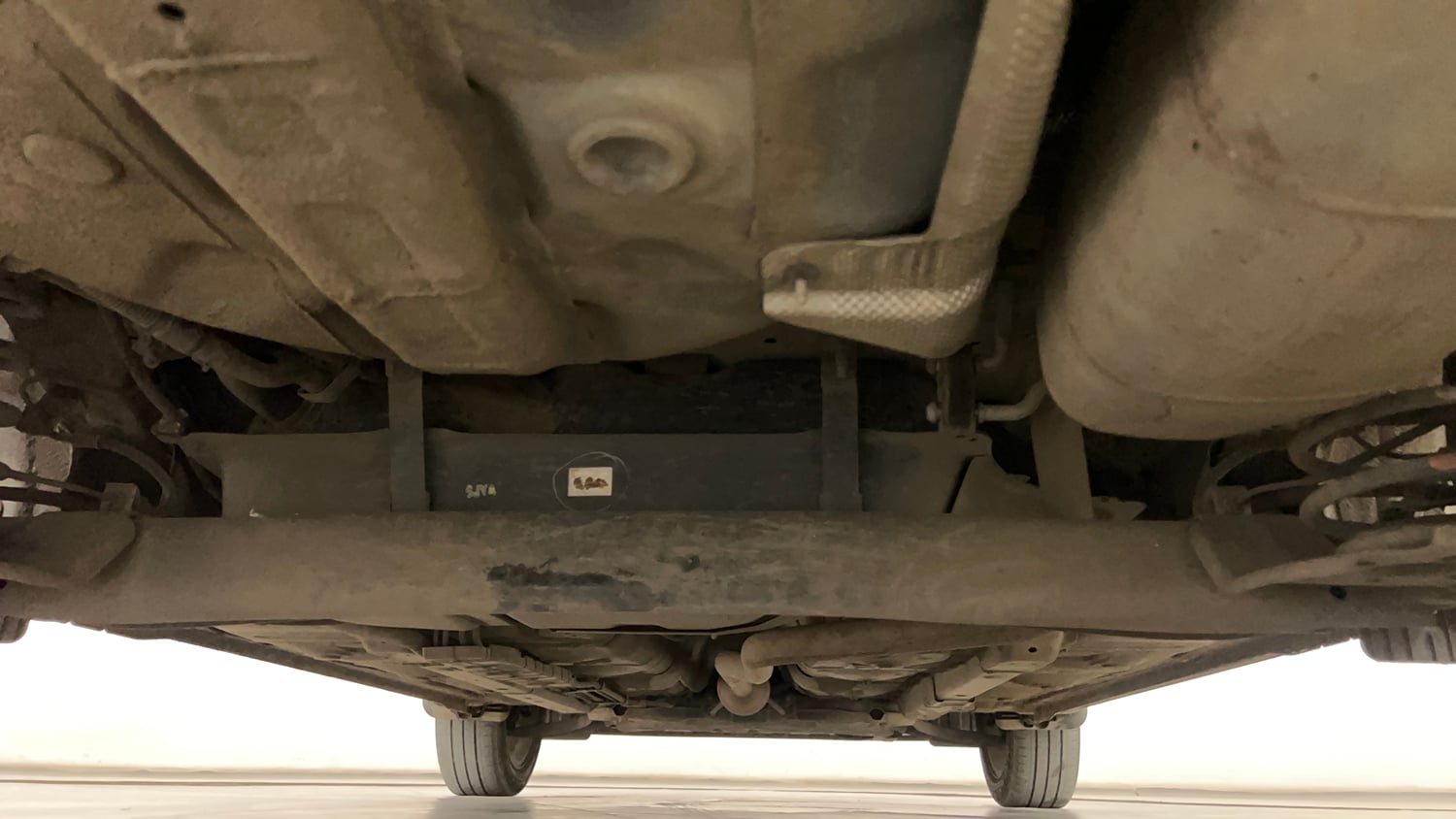 Used 2023 Hyundai Aura SX 1.2 CNG Cng Manual extra REAR UNDERBODY VIEW (TAKEN FROM REAR)