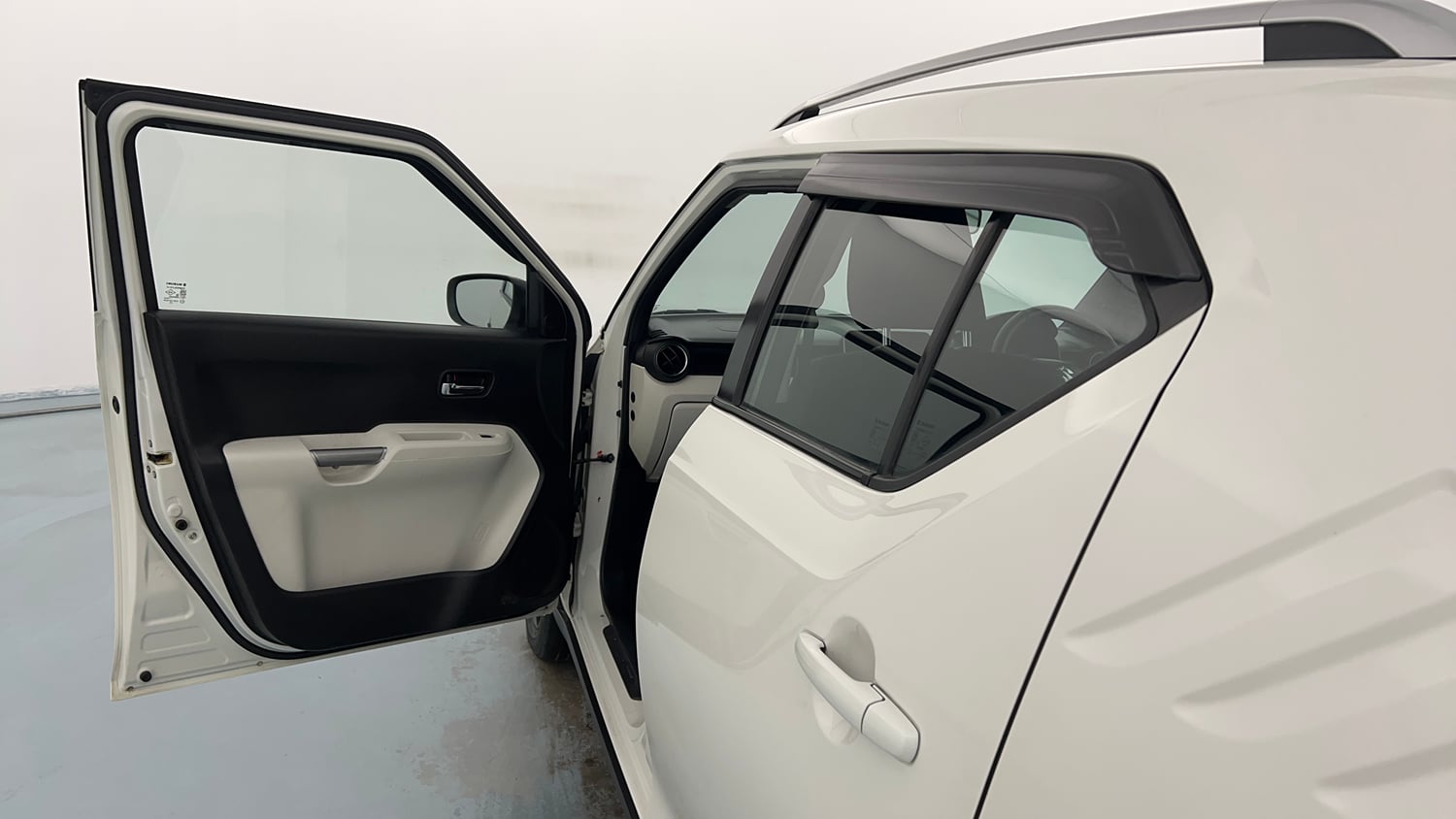 Used 2023 Maruti Suzuki Ignis Zeta 1.2 MT Petrol Manual interior LEFT FRONT DOOR OPEN VIEW