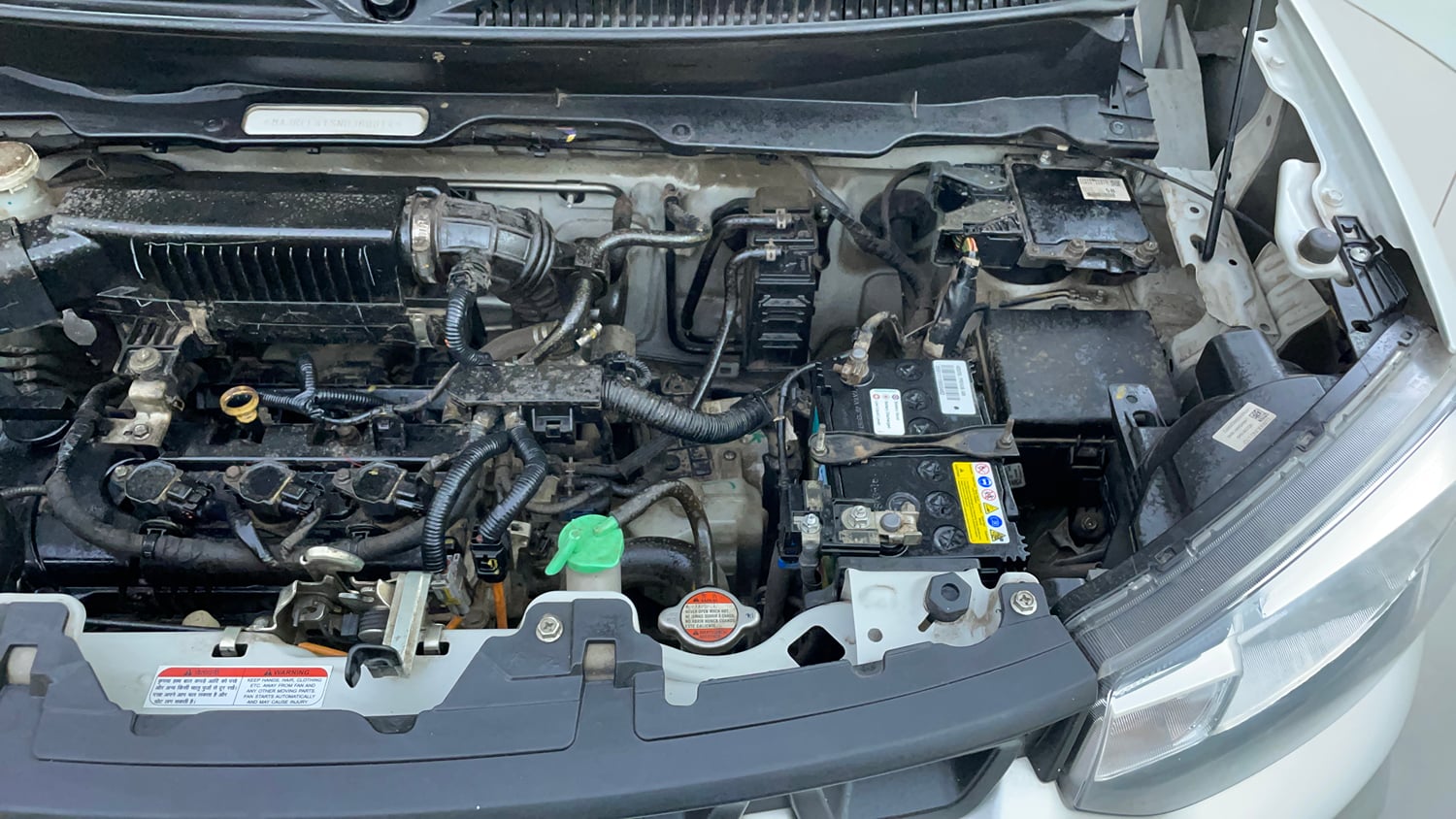 Used 2022 Maruti Suzuki S-Presso VXi (O) AMT Petrol Automatic engine ENGINE LEFT SIDE VIEW