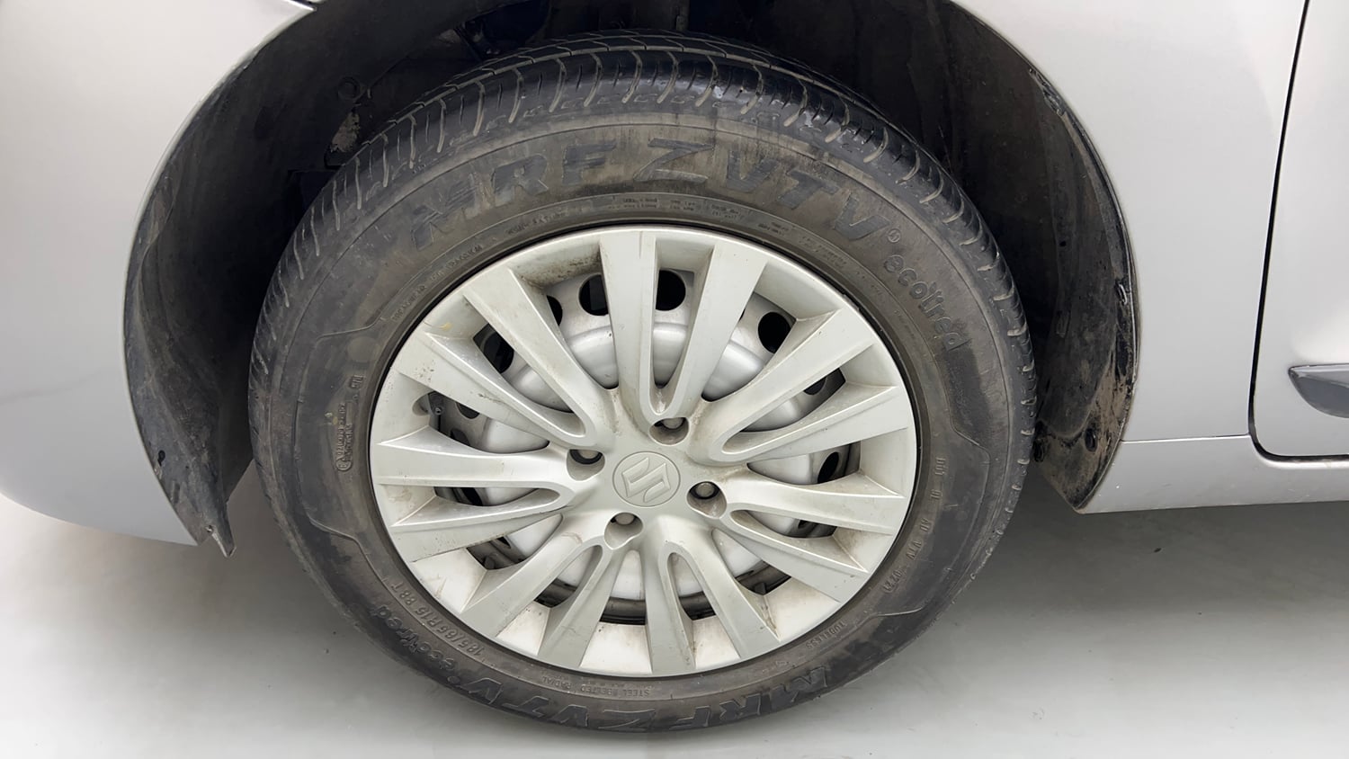 Used 2021 Maruti Suzuki Baleno Sigma Petrol Manual tyres LEFT FRONT TYRE RIM VIEW