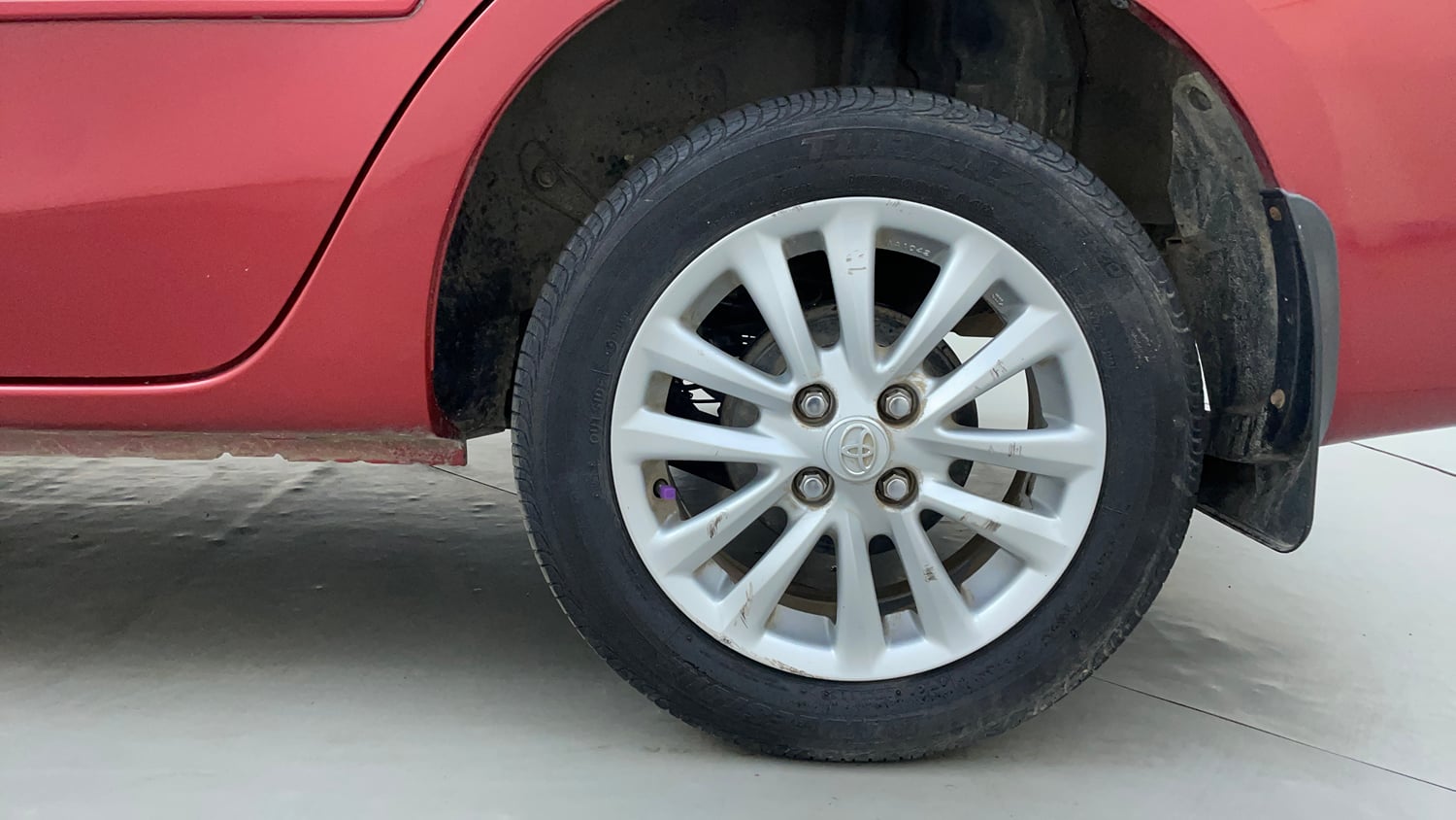 Used 2013 Toyota Etios V Petrol Manual tyres LEFT REAR TYRE RIM VIEW