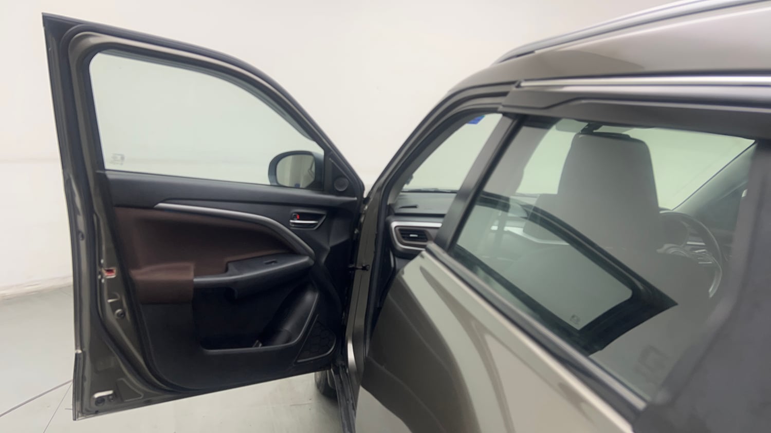 Used 2023 Maruti Suzuki Brezza ZXi Plus AT Petrol Automatic interior LEFT FRONT DOOR OPEN VIEW