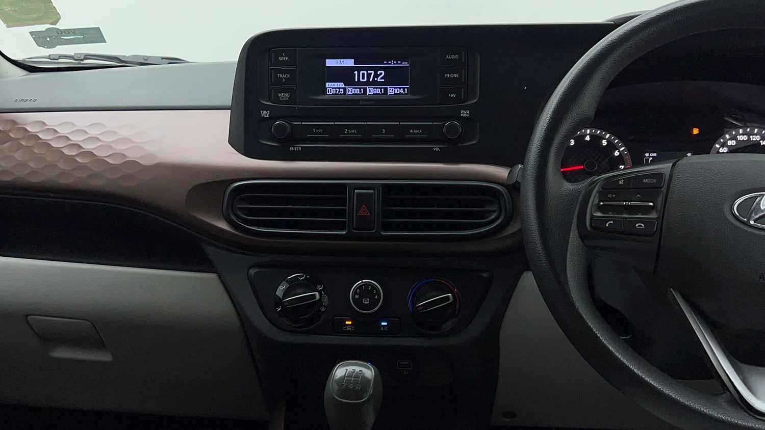 Used 2021 Hyundai Aura S 1.2 CNG Cng Manual interior MUSIC SYSTEM & AC CONTROL VIEW