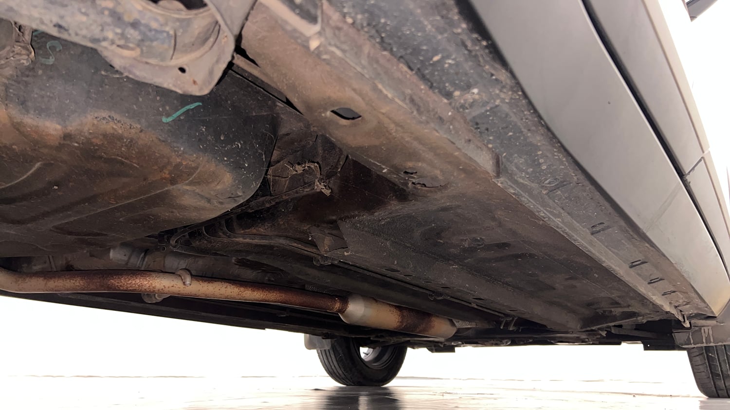 Used 2022 Nissan Magnite XV Turbo CVT Dual Tone Petrol Automatic extra REAR RIGHT UNDERBODY VIEW